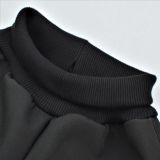 Zimní softshellové kalhoty černé s přestřižením zlatá srdíčka na černé - klasický střih vel. 128