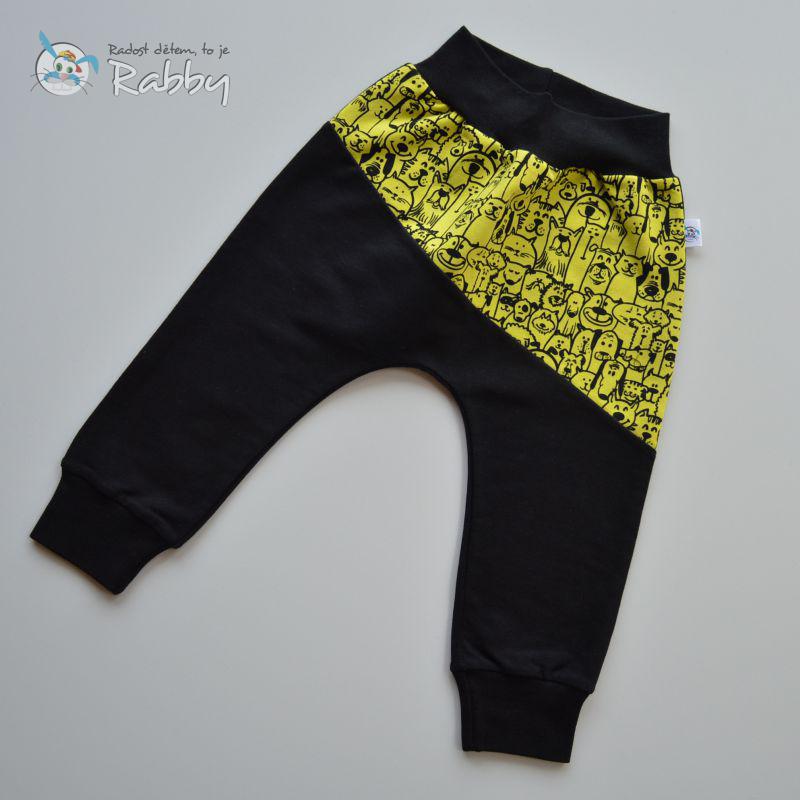 Baggy tepláčky černé s ozdobným přestřižením vel. 92