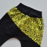 Baggy tepláčky černé s ozdobným přestřižením vel. 92
