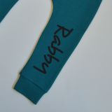 Baggy tepláčky petrolejové s nápisem Rabby vel.  80