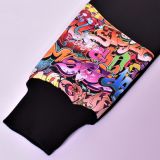 Zimní softshellové kalhoty černé s přestřižením graffiti - klasický střih vel.  98