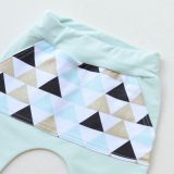 Baggy tepláčky mintové s kapsou mint trojúhelníky vel.  80