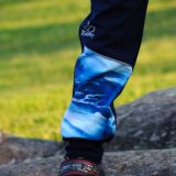 Zimní softshellové kalhoty modré s přestřižením vlny - klasický střih vel. 134