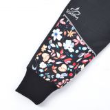 Jarní softshellové kalhoty černé s přestřižením kvítka - klasický střih vel. 134