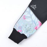 Jarní softshellové kalhoty černé s přestřižením květy na mintu - klasický střih vel.  98