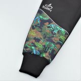 Zimní softshellové kalhoty černé s přestřižením dino na zelené - klasický střih vel. 104