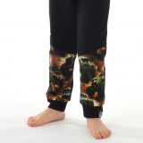 Klasické tepláky černé s přestřižením zelené traktory vel. 134