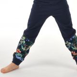 Klasické tepláky tm. modré s přestřižením dino na petroleji vel. 128