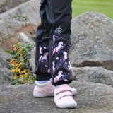 Zimní softshellové kalhoty černé s přestřižením jednorožci na černé - klasický střih vel. 104