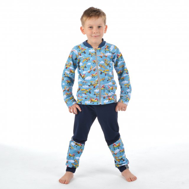 Klasické tepláky tm. modré s přestřižením letadla vel. 98